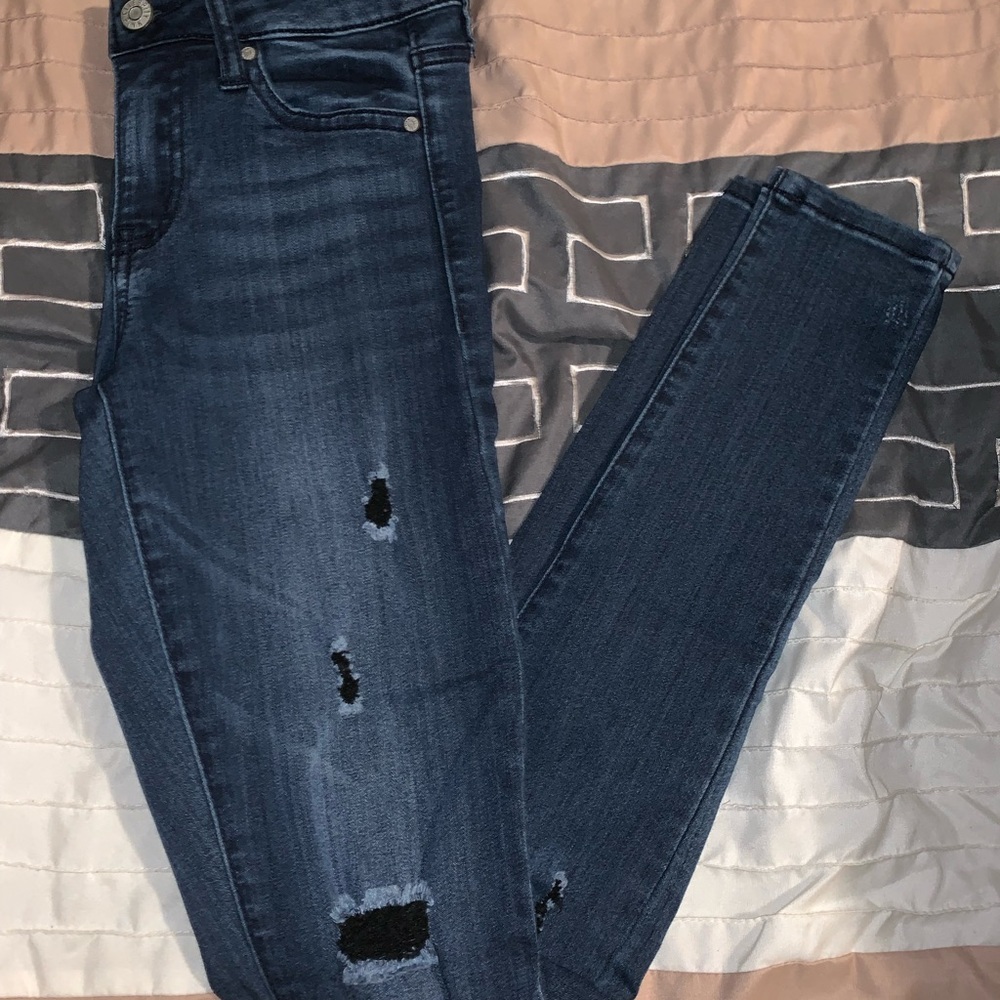 Dark blue ripped celebrity pink jeans